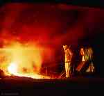 workers tapping the blast furnace